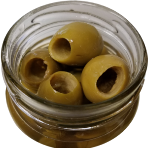 Green olives in a transparent jar