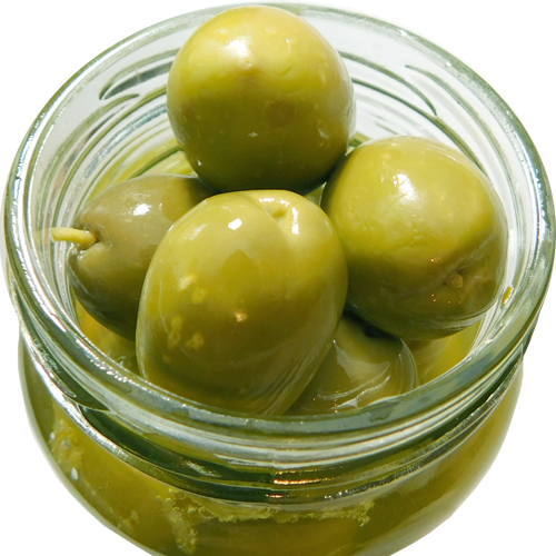 Pickled green olives in a transparent jar